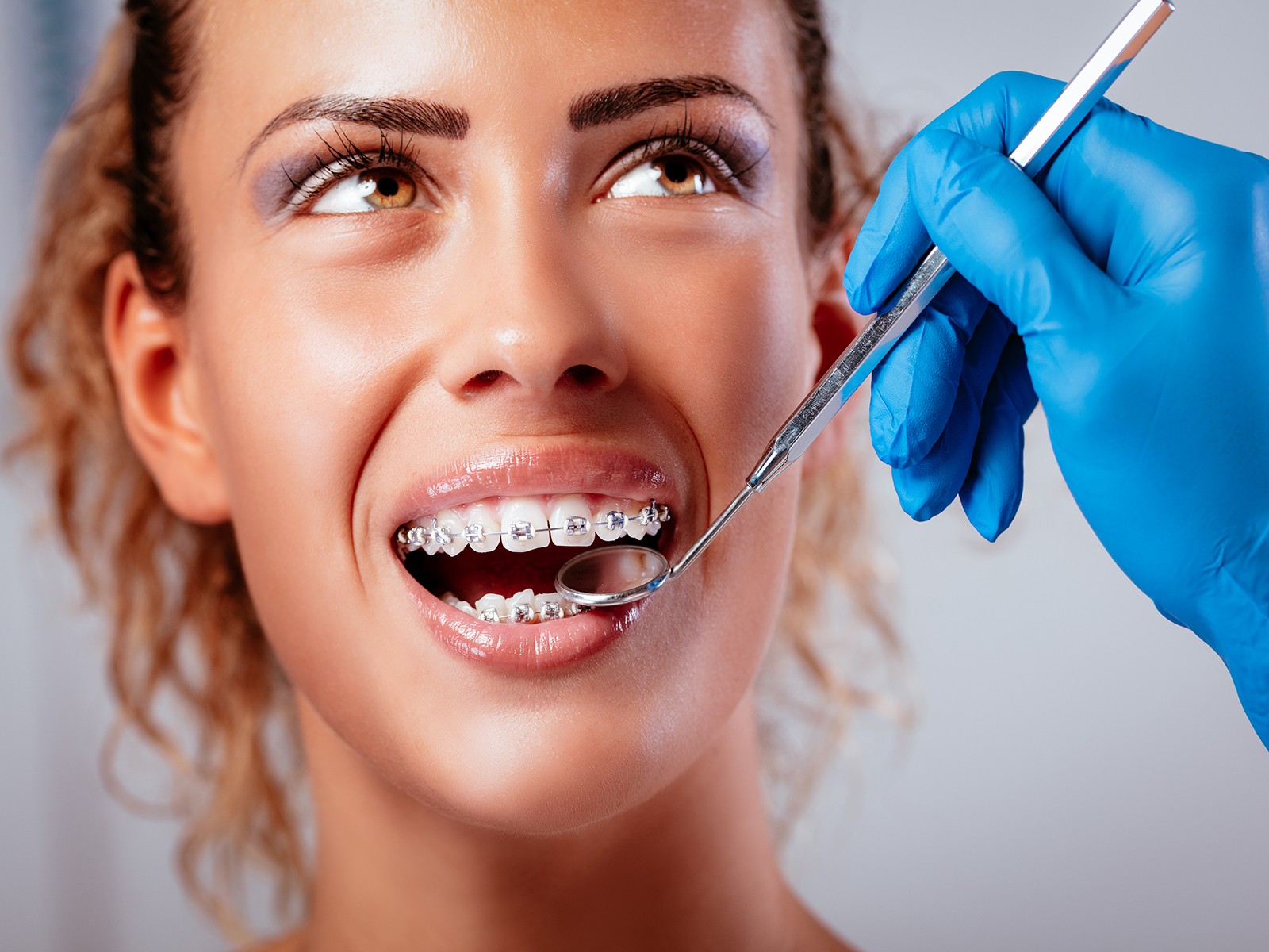 Does flossing help speed up braces?